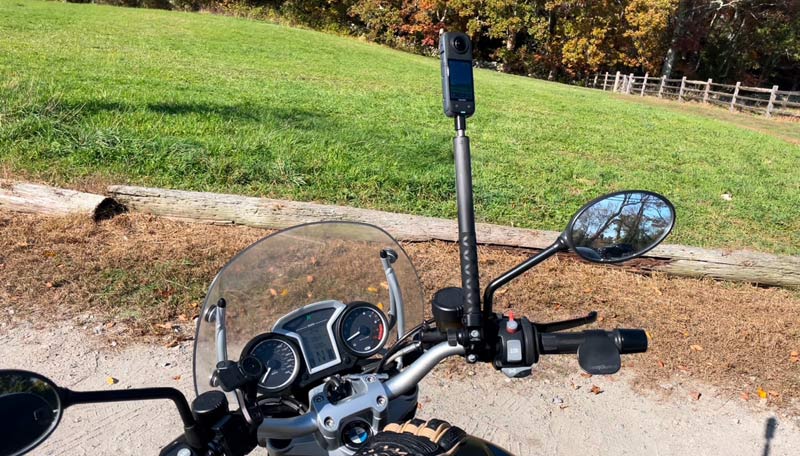 Insta360 Selfie Stick mounted on motorcycle handlebars